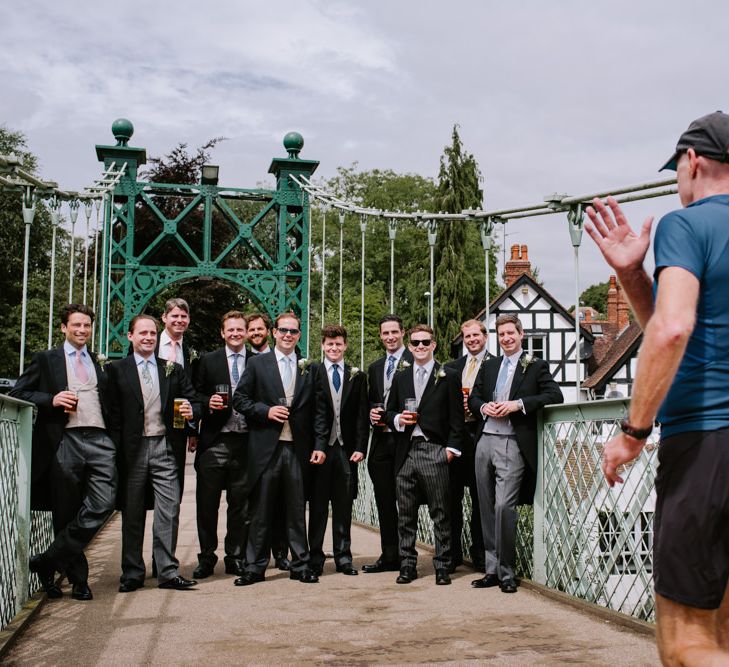 Groomsmen in Marks and Spencer Morning Suits | Bright Festival Themed At Home Wedding in a Tipi | McGivern Photography