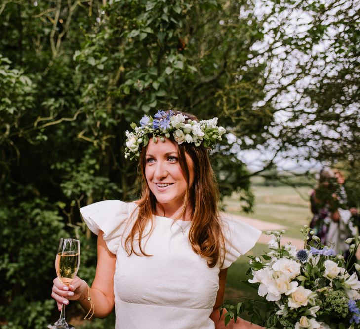 Bride in Floral Crown | Bright Festival Themed At Home Wedding in a Tipi | McGivern Photography