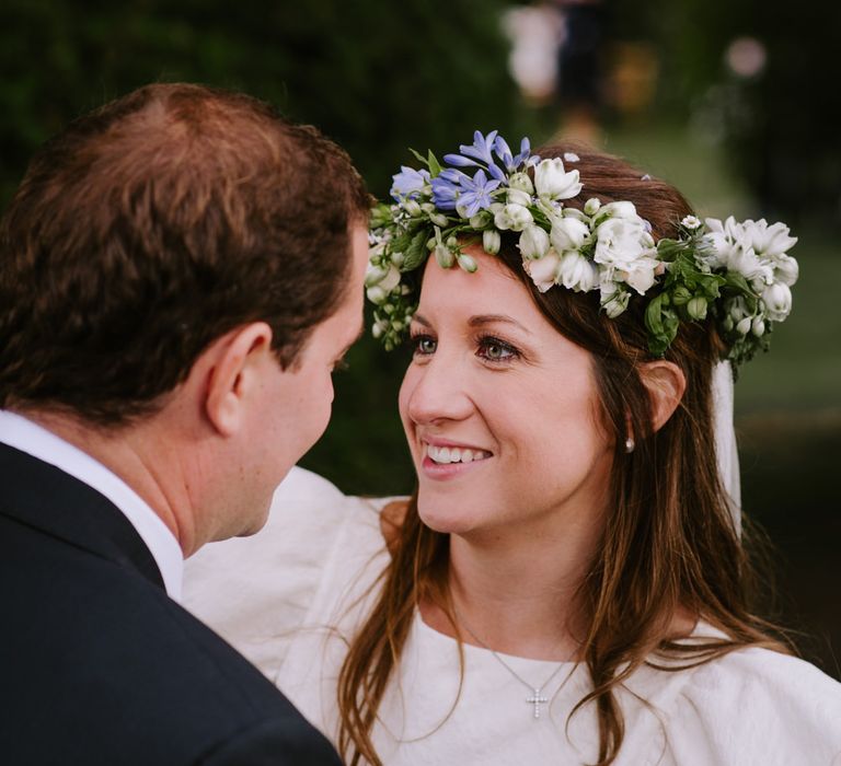 Beautiful Bride in White & Blue Flower Crown | Bright Festival Themed At Home Wedding in a Tipi | McGivern Photography