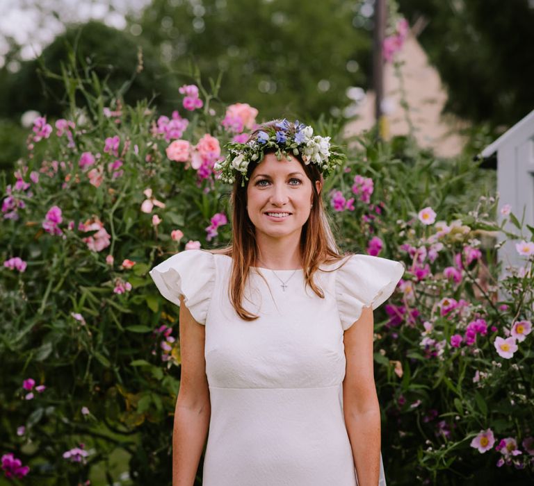 Beautiful Bride in The Mews Bridal Gown & Flower Crown | Bright Festival Themed At Home Wedding in a Tipi | McGivern Photography