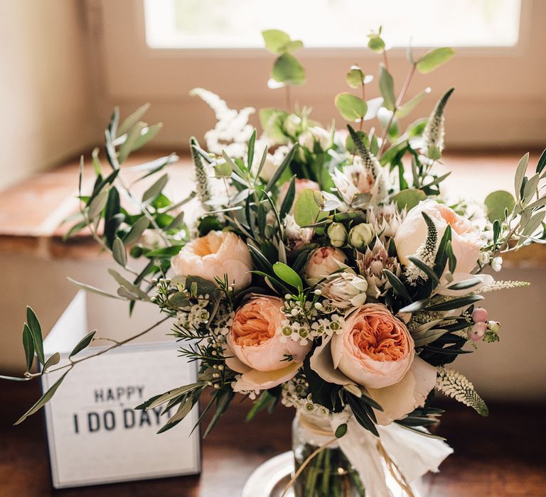 Protea, David Austin Rose, Thistle & Foliage Bouquet | Outdoor Destination Wedding at Château De Malliac Planned by Country Weddings in France | Styling by The Hand-Painted Bride | Samuel Docker Photography | Marriage in Motion Films