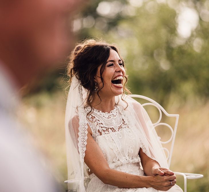 Wedding Ceremony | Bride in Lace Yolan Cris Gown | Outdoor Destination Wedding at Château De Malliac Planned by Country Weddings in France | Styling by The Hand-Painted Bride | Samuel Docker Photography | Marriage in Motion Films