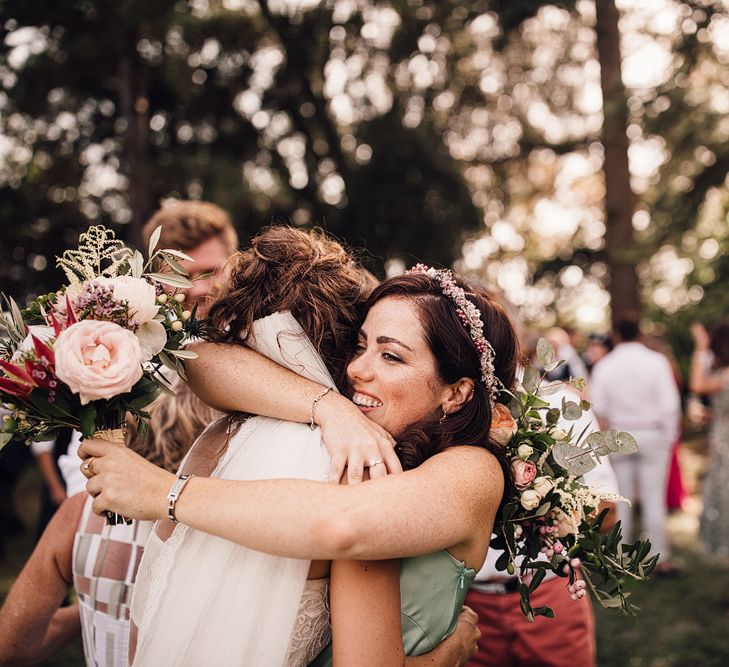 Wedding Hugs | Outdoor Destination Wedding at Château De Malliac Planned by Country Weddings in France | Styling by The Hand-Painted Bride | Samuel Docker Photography | Marriage in Motion Films