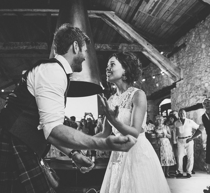 First Dance | Bride in Yolan Cris Lace Gown | Groom in Tartan Kilt | Outdoor Destination Wedding at Château De Malliac Planned by Country Weddings in France | Styling by The Hand-Painted Bride | Samuel Docker Photography | Marriage in Motion Films