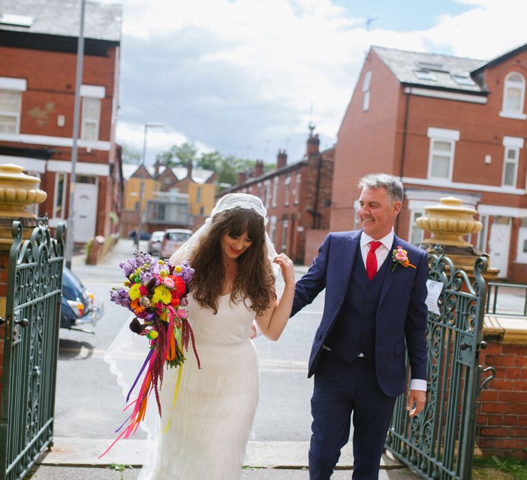 Bridal Entrance in Charlie Brear Wedding Dress