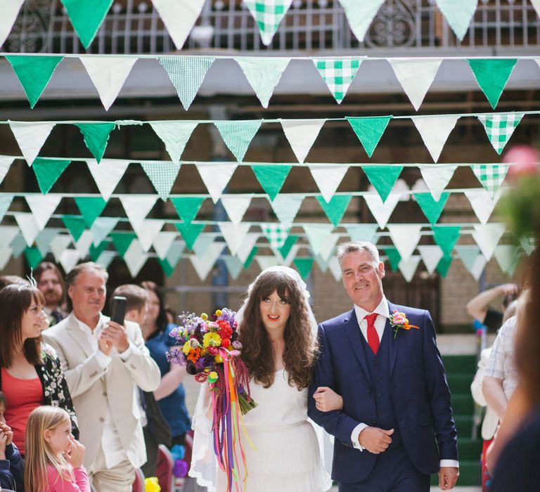 Bridal Entrance in Charlie Brear Wedding Dress