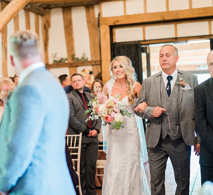 Wedding Ceremony | Bridal Entrance in Lace Enzoani 'Inaru' Bridal Gown | Groom in Grey Wool Master Debonair Suit | Pink & Coral Country Wedding at Crabbs Barn, Essex | Kathryn Hopkins Photography | Film by Colbridge Media Services Ltd