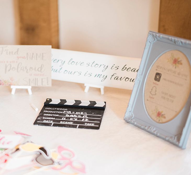 Polaroid Picture Guest Book Station | Romantic Peach & Coral Floral Centrepiece | Peach & Coral Country Wedding at Crabbs Barn, Essex | Kathryn Hopkins Photography | Film by Colbridge Media Services Ltd