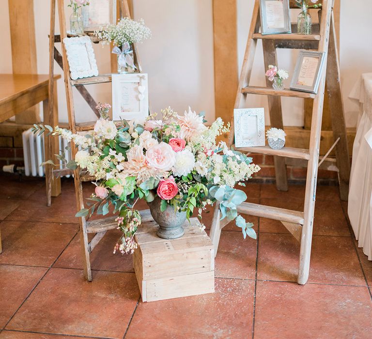 Vintage Step Ladders, Wooden Crate & Blush Floral Arrangement Wedding Decor | Romantic Peach & Coral Floral Centrepiece | Peach & Coral Country Wedding at Crabbs Barn, Essex | Kathryn Hopkins Photography | Film by Colbridge Media Services Ltd