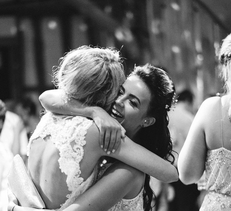 Hugs | Bride in Lace Enzoani 'Inaru' Bridal Gown | Pink & Coral Country Wedding at Crabbs Barn, Essex | Kathryn Hopkins Photography | Film by Colbridge Media Services Ltd