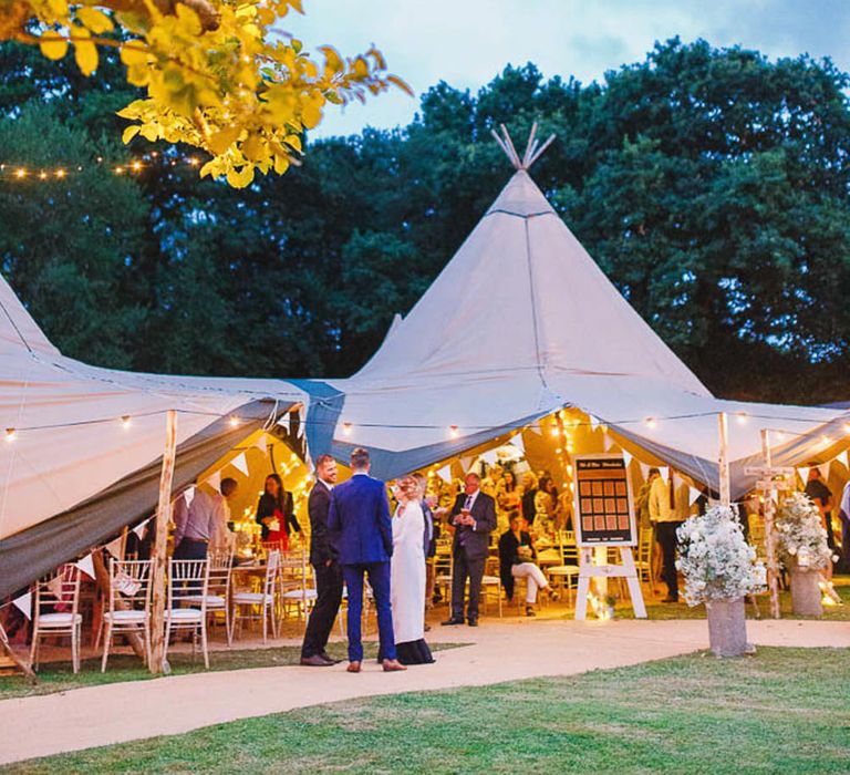 Outdoor Tipi Reception with Festoon Lights