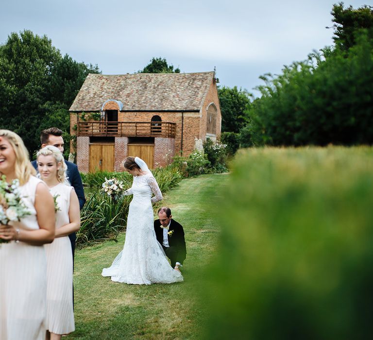 Outdoor Wedding Ceremony at Childerley Hall | Bride in Lace Sottero & Midgley Gown | Bridesmaids in & Other Stories Dresses | Tawny Photo