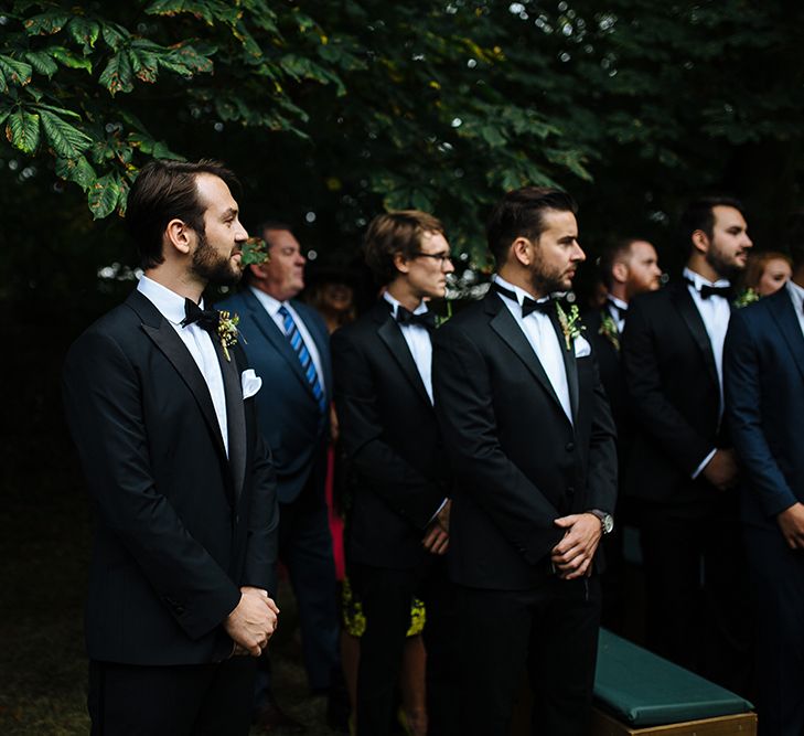 Groom in Herrvon Eden Tuxedo | Groomsmen in Marks and Spencer Suits | Tawny Photo