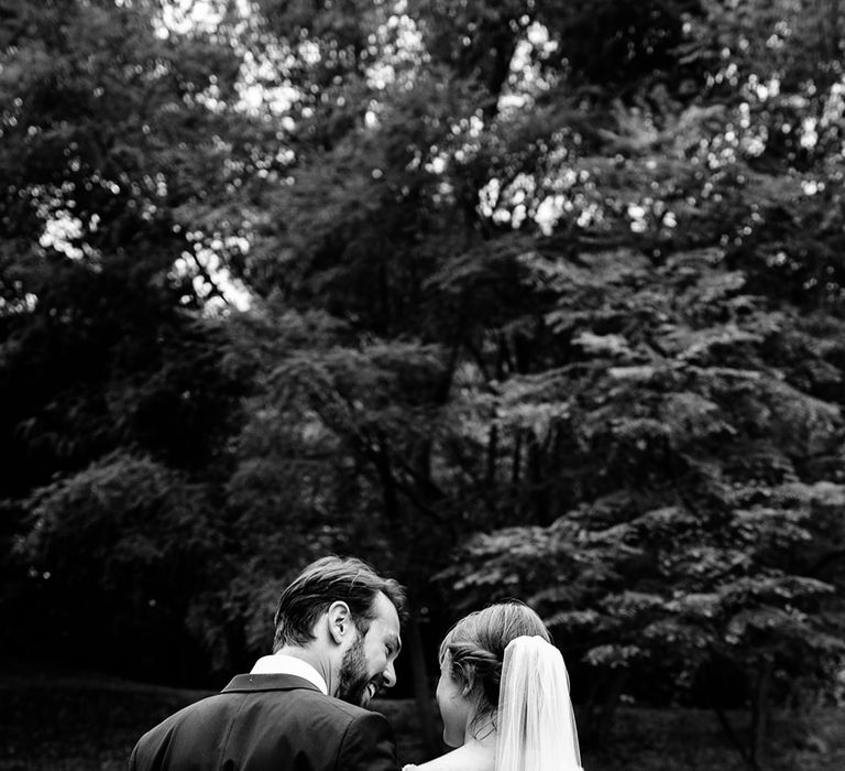 Bride in Lace Sottero & Midgley Gown | Groom in Herrvon Eden Tuxedo | Tawny Photo