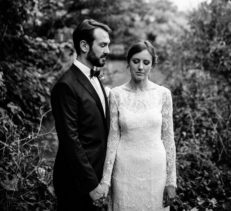 Childerley Hall Wedding | Bride in Lace Sottero & Midgley Gown | Groom in Herrvon Eden Tuxedo | Tawny Photo