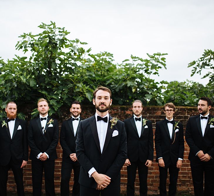 Groom in Herrvon Eden Tuxedo | Groomsmen in Marks and Spencer Tuxedo | Tawny Photo