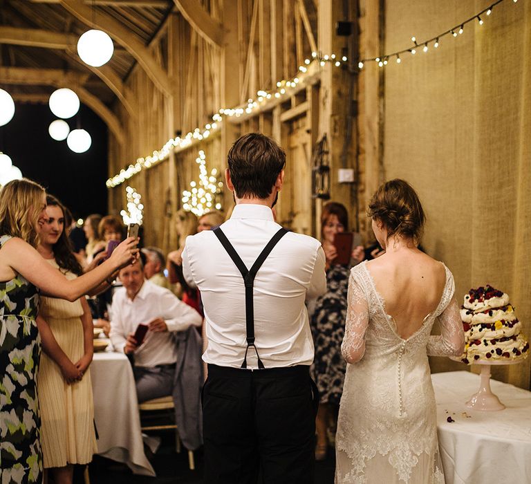 Cutting the Cake | Bride in Sottero & Midgley Lace Gown | Tawny Photo