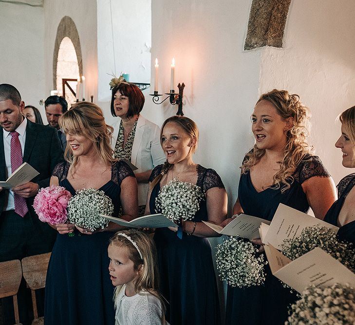 Wedding Ceremony | Bridesmaid in Navy ASOS Dresses with Gypsophila Bouquets | Isles of Scilly Wedding | Jason Mark Harris Photography