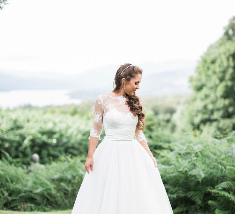 Bride in Lace Wedding Dress from Agape Bridal Boutique