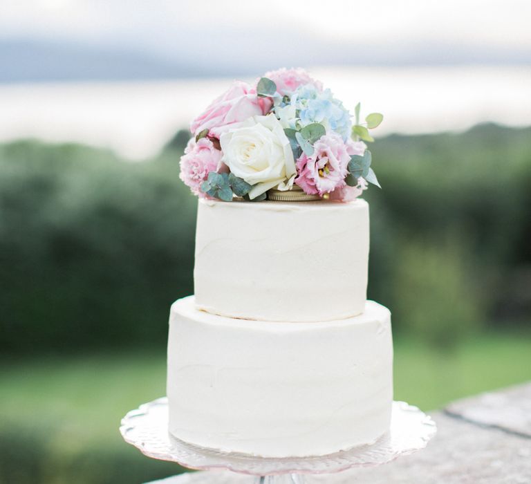 Elegant Two Tier Wedding Cake with Pastel Floral Cake Topper