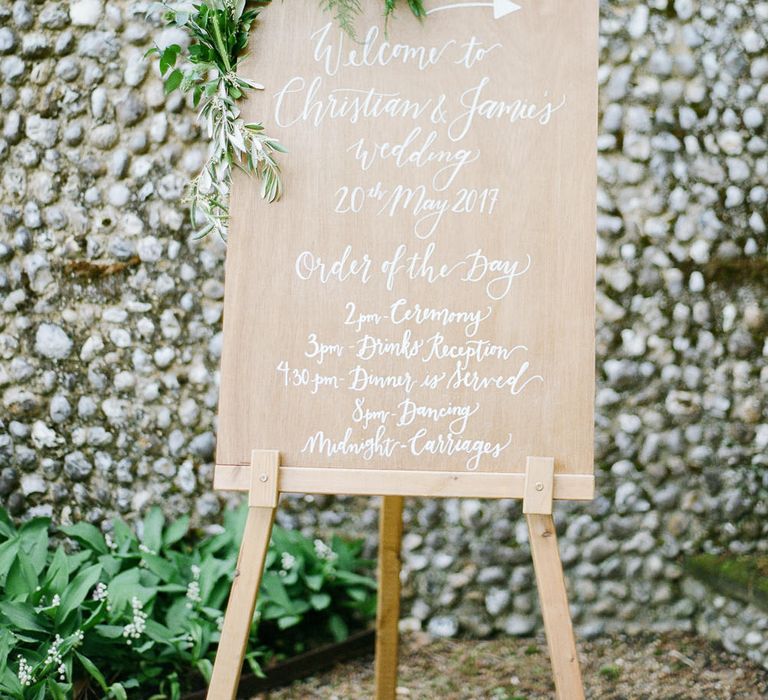 Wooden Order of The Day Sign | Classic Green & White Outdoor Country Wedding at Voewood in Norfolk, Planned & Styled by Vanilla Rose Weddings & Events | Julie Michaelsen Photography