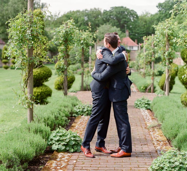 Grooms in Walker Slater Suits | Classic Green & White Outdoor Country Wedding at Voewood in Norfolk, Planned & Styled by Vanilla Rose Weddings & Events | Julie Michaelsen Photography