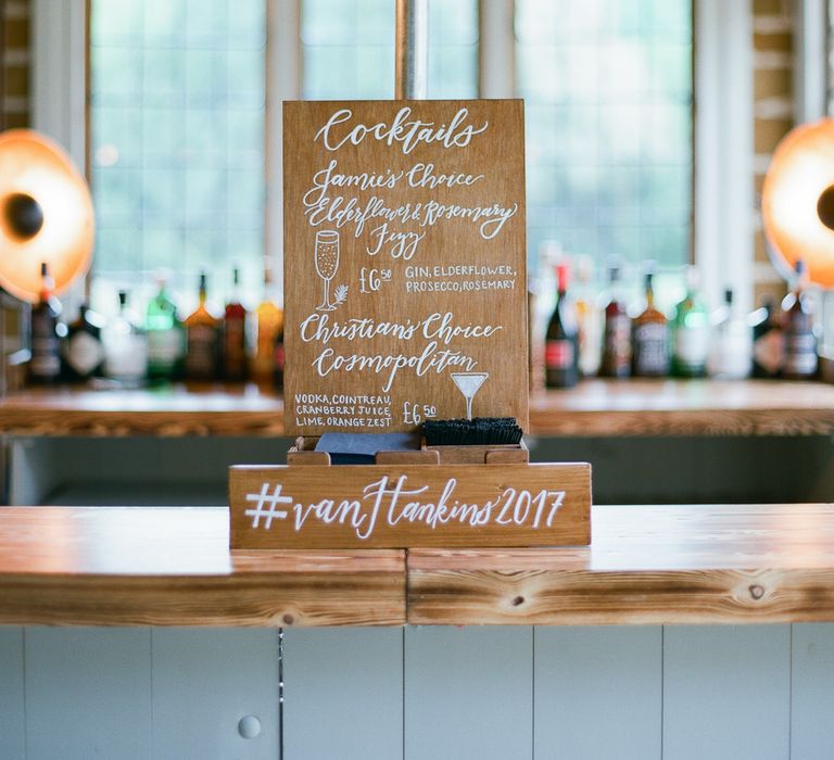 Wooden Wedding Signs | Classic Green & White Outdoor Country Wedding at Voewood in Norfolk, Planned & Styled by Vanilla Rose Weddings & Events | Julie Michaelsen Photography