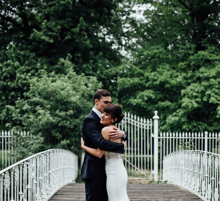 Bride in Illusion Back Martina Liana Bridal Gown | Groom in Gieves & Hawkes Suit | Modern Hall London | Beatrici Photography