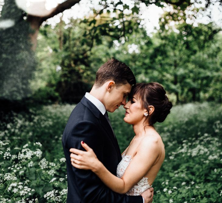 Bride in Illusion Back Martina Liana Bridal Gown | Groom in Gieves & Hawkes Suit | Modern Hall London | Beatrici Photography