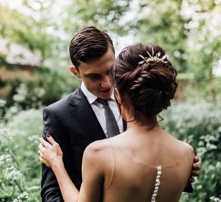 Bride in Illusion Back Martina Liana Bridal Gown | Groom in Gieves & Hawkes Suit | Modern Hall London | Beatrici Photography