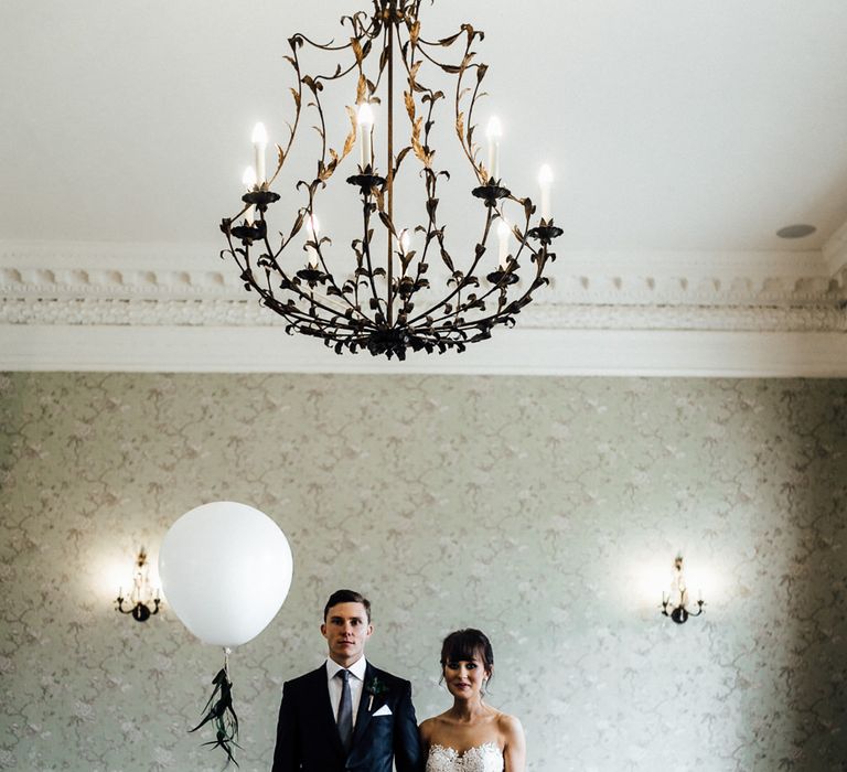 Bride in Illusion Back Martina Liana Bridal Gown | Groom in Gieves & Hawkes Suit | Modern Hall London | Beatrici Photography