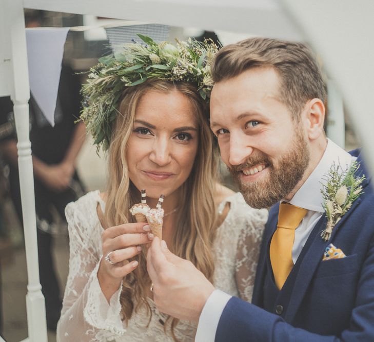 Bride in Inbral Dror Wedding Dress & Groom in Navy Beggars Run Suit