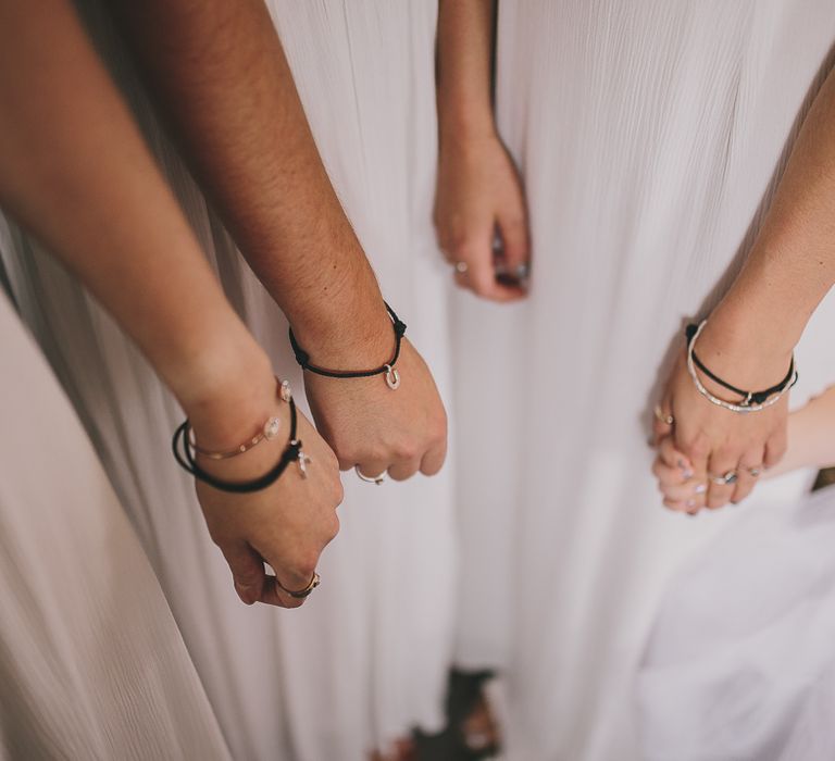 Bridesmaids in White Dresses with Bracelets | Steven Haddock Photography