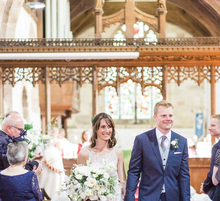 Church Wedding Ceremony | Bride in Hermia Jenny Packham Gown | Groom in Navy Reiss Suit | Elegant Hampton Manor Wedding with Floral Decor | Xander & Thea Fine Art Wedding Photography