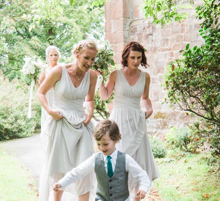 Bridesmaids in Grey Dessy Bridesmaid Dresses | Elegant Hampton Manor Wedding with Floral Decor | Xander & Thea Fine Art Wedding Photography