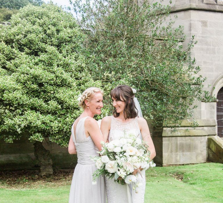 Bridesmaid in Grey Dessy Dresses | Bride in Jenny Packham | Elegant Hampton Manor Wedding with Floral Decor | Xander & Thea Fine Art Wedding Photography