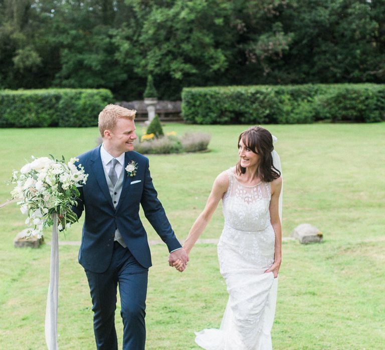 Bride in Jenny Packham | Groom in Navy Reiss Suit | Elegant Hampton Manor Wedding with Floral Decor | Xander & Thea Fine Art Wedding Photography