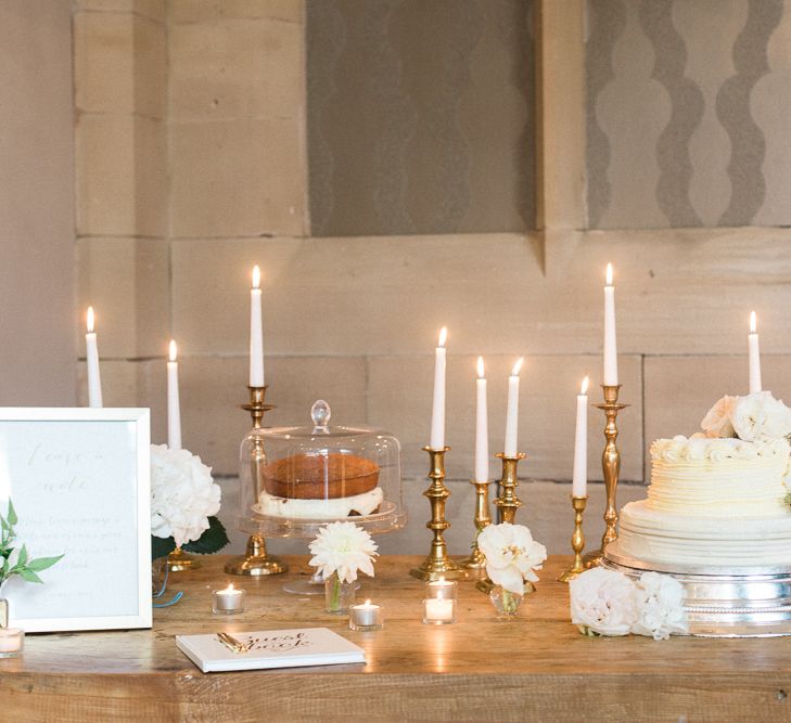 Cake Table with Candlestick Decor | Elegant Hampton Manor Wedding with Floral Decor | Xander & Thea Fine Art Wedding Photography