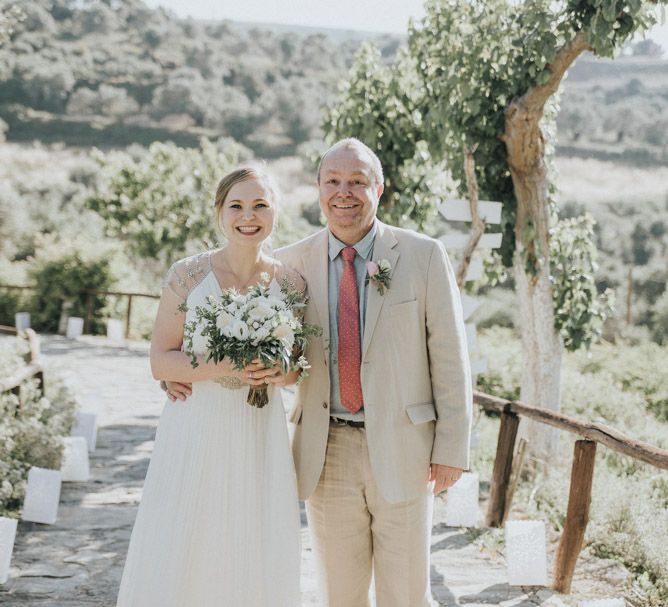 Bride in Catherine Deane Gown | Father of the Bride in Beige Austin Reed Suit | Outdoor Pastel Destination Wedding at Agreco in Greece | Best Moments Wedding Planner | Paulina Weddings Photography