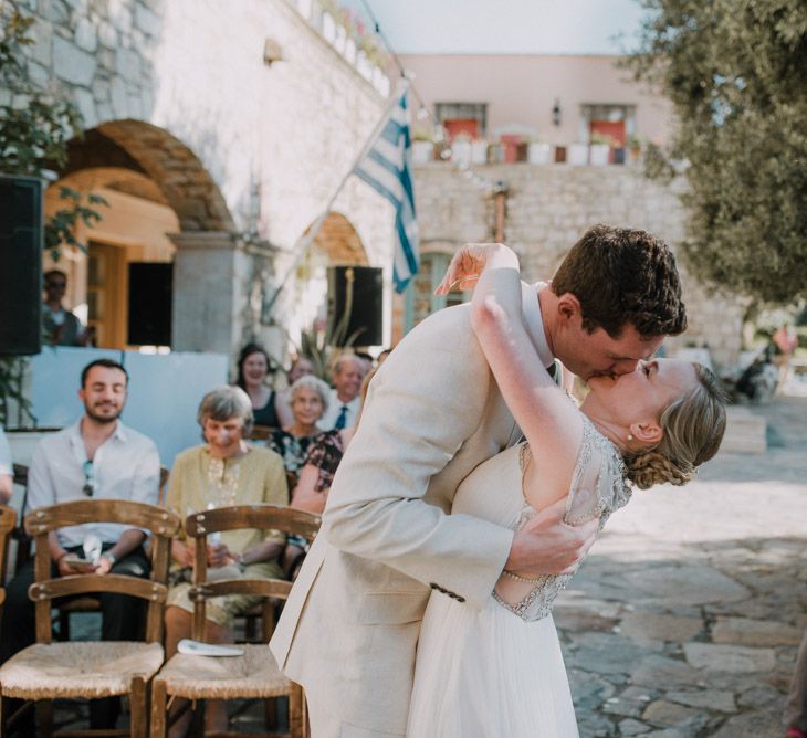 Wedding Ceremony | Bride in Catherine Deane Gown | Groom in Beige Austin Reed Suit | Outdoor Pastel Destination Wedding at Agreco in Greece | Best Moments Wedding Planner | Paulina Weddings Photography