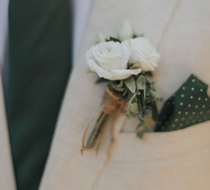 Delicate White Flower Buttonhole | Outdoor Pastel Destination Wedding at Agreco in Greece | Best Moments Wedding Planner | Paulina Weddings Photography