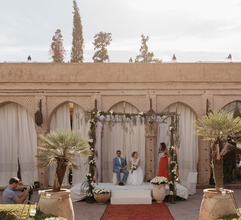 Bride in Celestina Agostino Wedding Dress | Groom in Light Blue Suit | Beldi Hotel, Marrakech Destination Wedding | Lifestories Wedding Photography