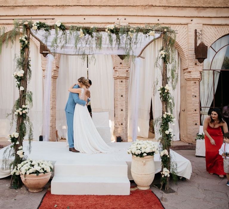 Bride in Celestina Agostino Wedding Dress | Groom in Light Blue Suit | Beldi Hotel, Marrakech Destination Wedding | Lifestories Wedding Photography