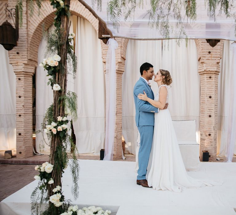 Bride in Celestina Agostino Wedding Dress | Groom in Light Blue Suit | Beldi Hotel, Marrakech Destination Wedding | Lifestories Wedding Photography