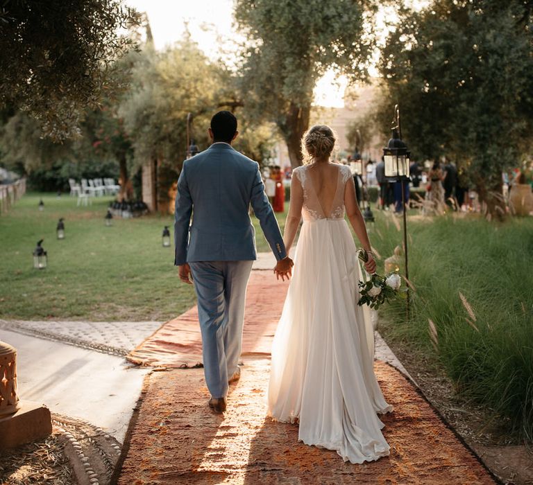 Bride in Celestina Agostino Wedding Dress | Groom in Light Blue Suit | Beldi Hotel, Marrakech Destination Wedding | Lifestories Wedding Photography