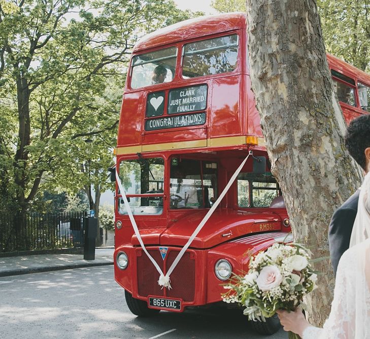 Red Bus transport to wedding reception | Brunswick House | Images by McKinley Rogers