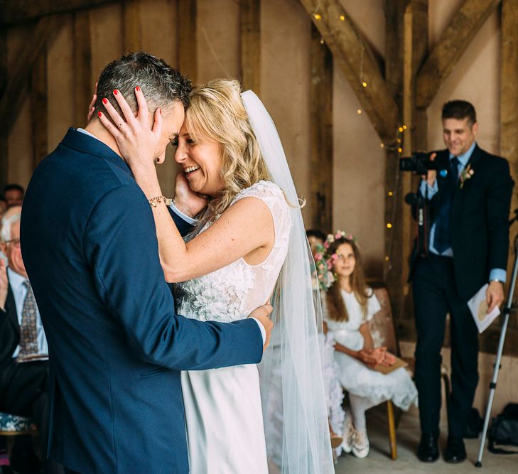 Wedding Ceremony | Bride in Ivy & Aster Gown | Groom in Reiss Suit | Rustic Wedding at Yoghurt Rooms in Sussex | Louise Griffin Photography