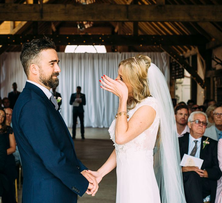 Wedding Ceremony | Bride in Ivy & Aster Gown | Groom in Reiss Suit | Rustic Wedding at Yoghurt Rooms in Sussex | Louise Griffin Photography