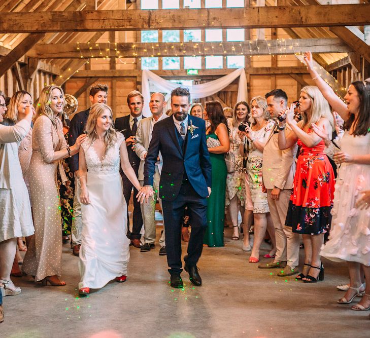 First Dance | Bride in Ivy & Aster Secret Garden Wedding Dress | Groom in Navy Reiss Suit | Rustic Wedding at Yoghurt Rooms in Sussex | Louise Griffin Photography