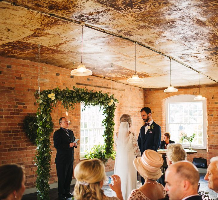 Industrial Wedding Ceremony at The West Mill | Greenery Flower Arch | S6 Photography